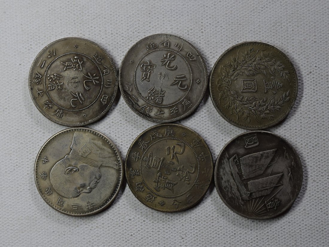 SIX CHINESE DOLLAR COINS: SIX CHINESE DOLLAR COINS. Each weight around 26.5 gram. Domestic shipping $5 and oversea $10. Combined shipping available. We accept pre-sale offer, phone bidding and post sale offer. For buyers from 