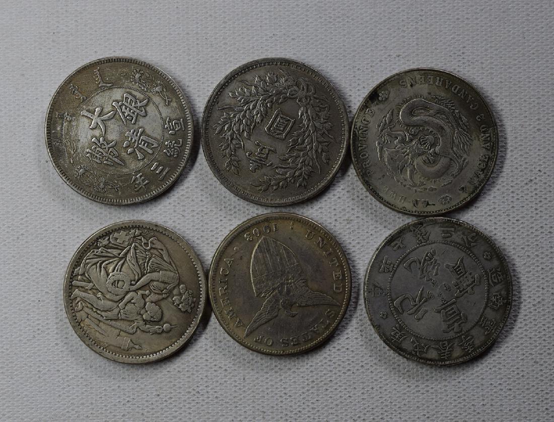 SIX CHINESE DOLLAR COINS: SIX CHINESE DOLLAR COINS. Each weight around 26.5 gram. Domestic shipping $5 and oversea $10. Combined shipping available. We accept pre-sale offer, phone bidding and post sale offer. For buyers from 