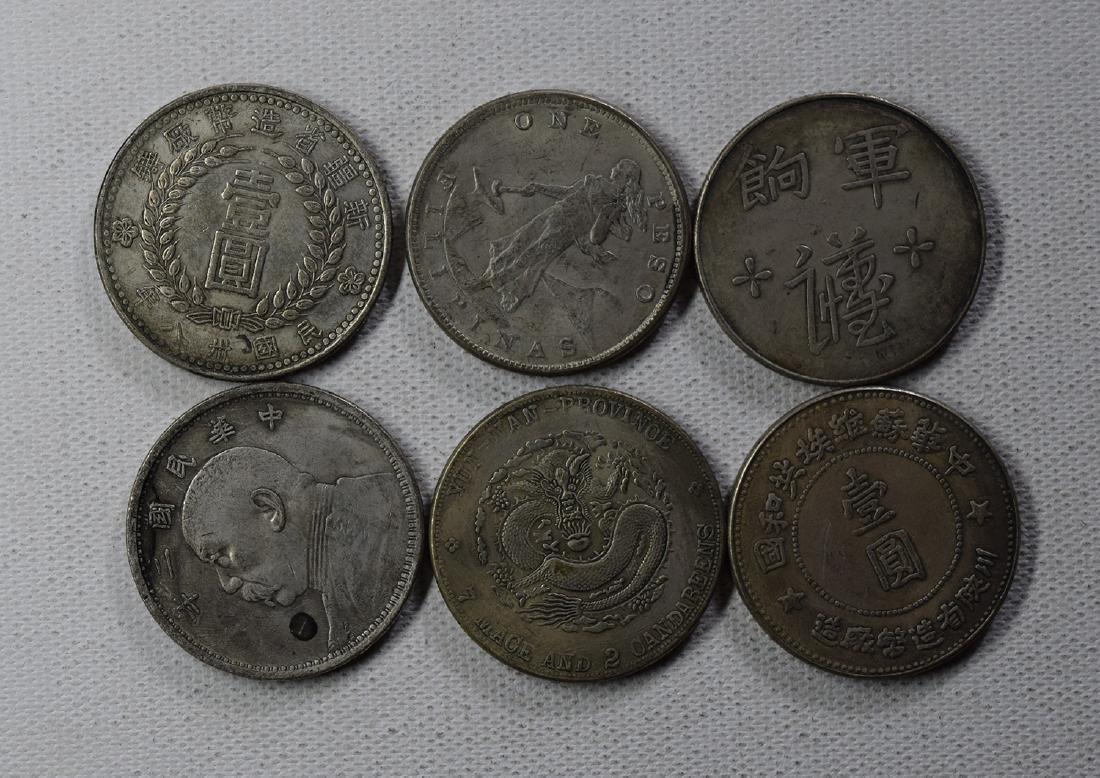 SIX CHINESE DOLLAR COINS: SIX CHINESE DOLLAR COINS. Each weight around 26.5 gram. Domestic shipping $5 and oversea $10. Combined shipping available. We accept pre-sale offer, phone bidding and post sale offer. For buyers from 