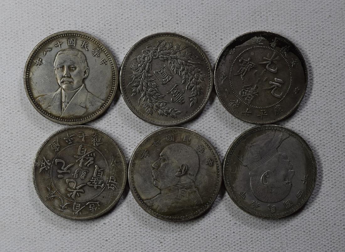 SIX CHINESE DOLLAR COINS: SIX CHINESE DOLLAR COINS. Each weight around 26.5 gram. Domestic shipping $5 and oversea $10. Combined shipping available. We accept pre-sale offer, phone bidding and post sale offer. For buyers from 