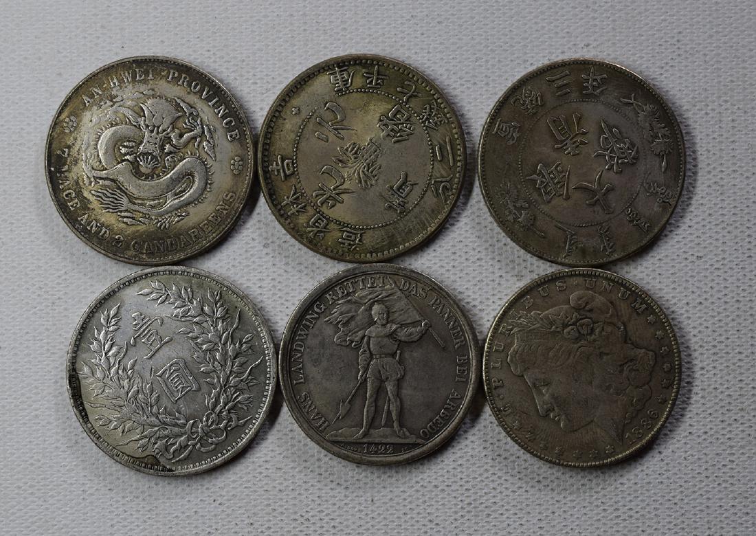 SIX CHINESE DOLLAR COINS: SIX CHINESE DOLLAR COINS. Each weight around 26.5 gram. Domestic shipping $5 and oversea $10. Combined shipping available. We accept pre-sale offer, phone bidding and post sale offer. For buyers from 