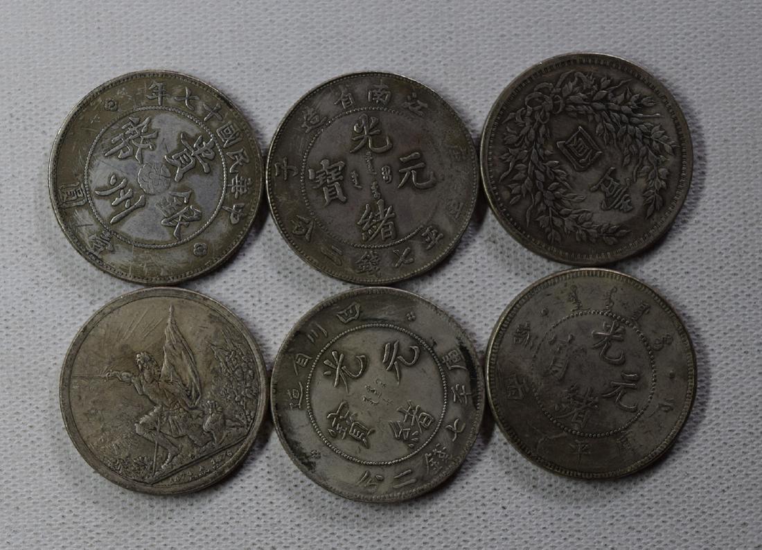 SIX CHINESE DOLLAR COINS: SIX CHINESE DOLLAR COINS. Each weight around 26.5 gram. Domestic shipping $5 and oversea $10. Combined shipping available. We accept pre-sale offer, phone bidding and post sale offer. For buyers from 