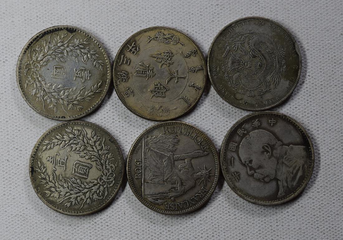 SIX CHINESE DOLLAR COINS: SIX CHINESE DOLLAR COINS. Each weight around 26.5 gram. Domestic shipping $5 and oversea $10. Combined shipping available. We accept pre-sale offer, phone bidding and post sale offer. For buyers from 