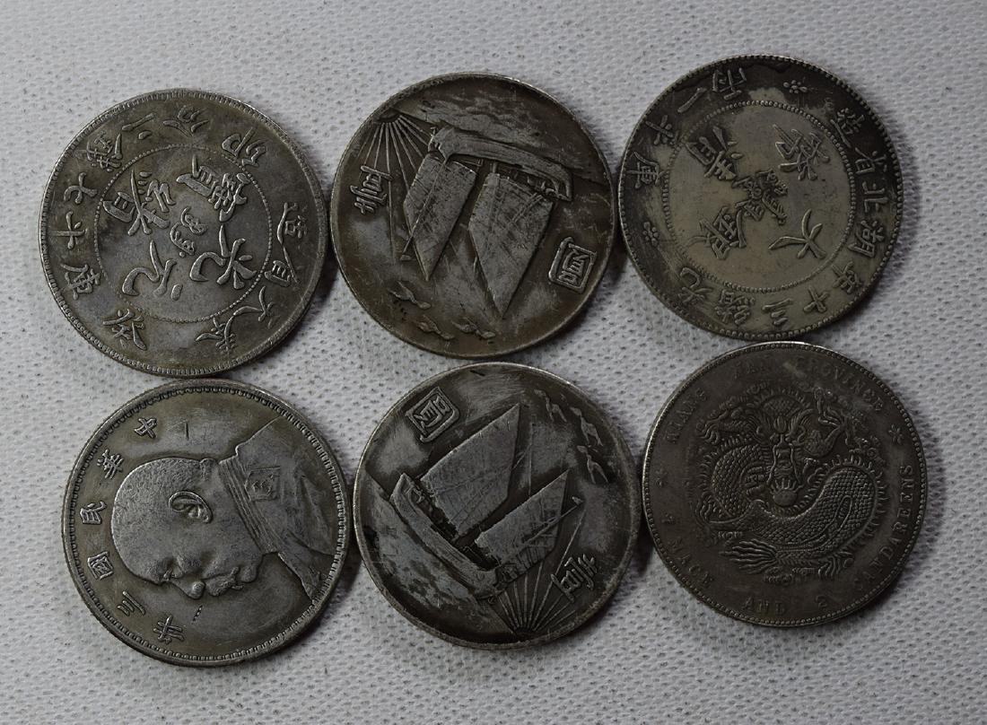 SIX CHINESE DOLLAR COINS: SIX CHINESE DOLLAR COINS. Each weight around 26.5 gram. Domestic shipping $5 and oversea $10. Combined shipping available. We accept pre-sale offer, phone bidding and post sale offer. For buyers from 