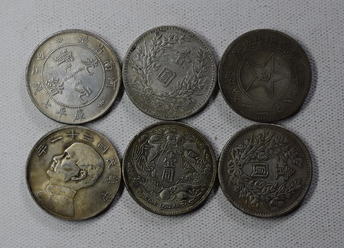 SIX CHINESE DOLLAR COINS (1 of 3)
