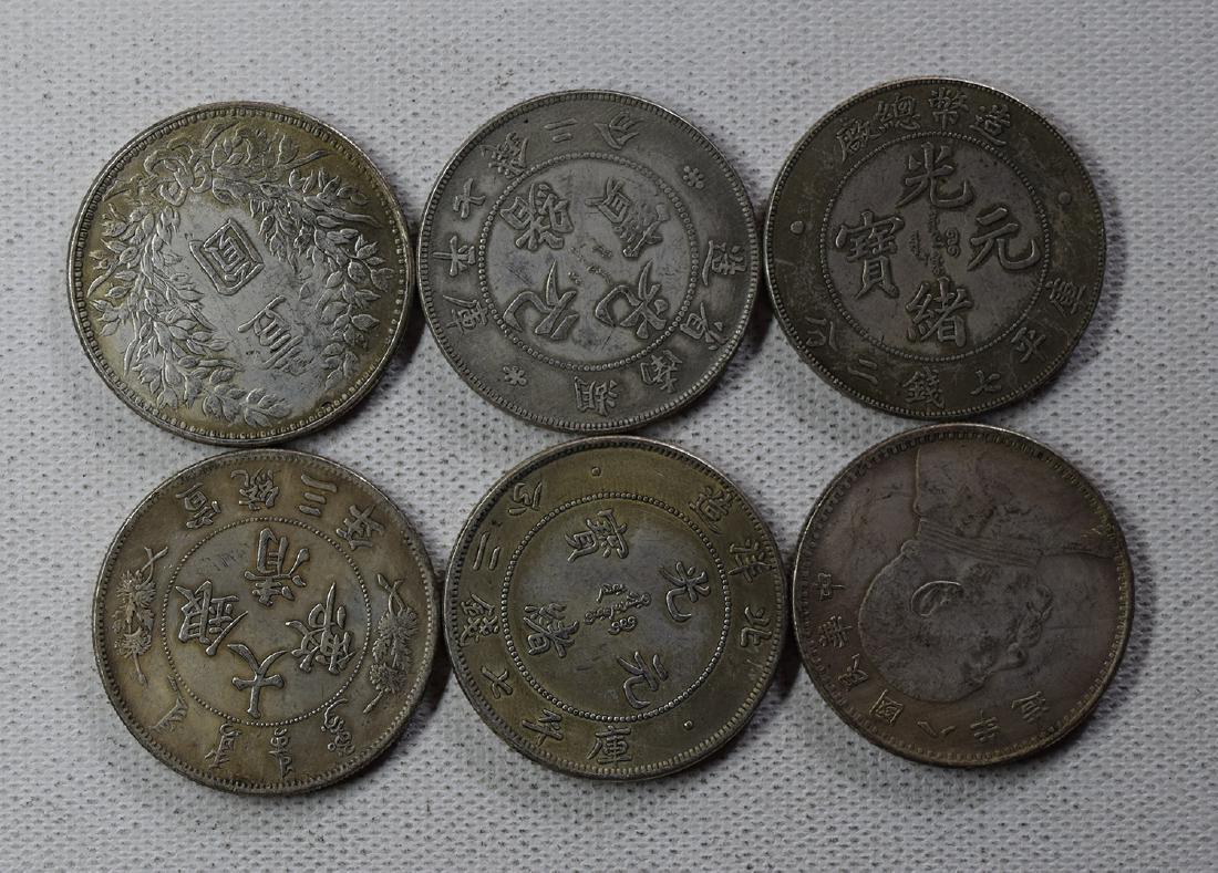 SIX CHINESE DOLLAR COINS: SIX CHINESE DOLLAR COINS. Each weight around 26.5 gram. Domestic shipping $5 and oversea $10. Combined shipping available. We accept pre-sale offer, phone bidding and post sale offer. For buyers from 