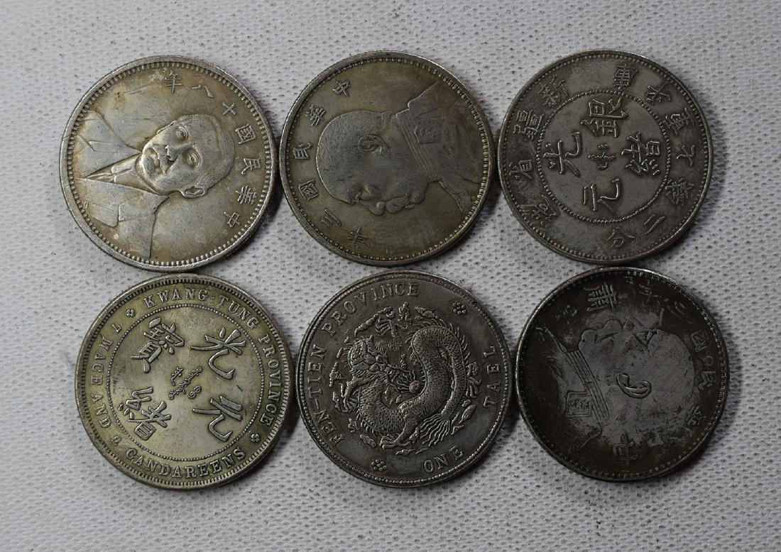 SIX CHINESE DOLLAR COINS: SIX CHINESE DOLLAR COINS. Each weight around 26.5 gram. Domestic shipping $5 and oversea $10. Combined shipping available. We accept pre-sale offer, phone bidding and post sale offer. For buyers from 