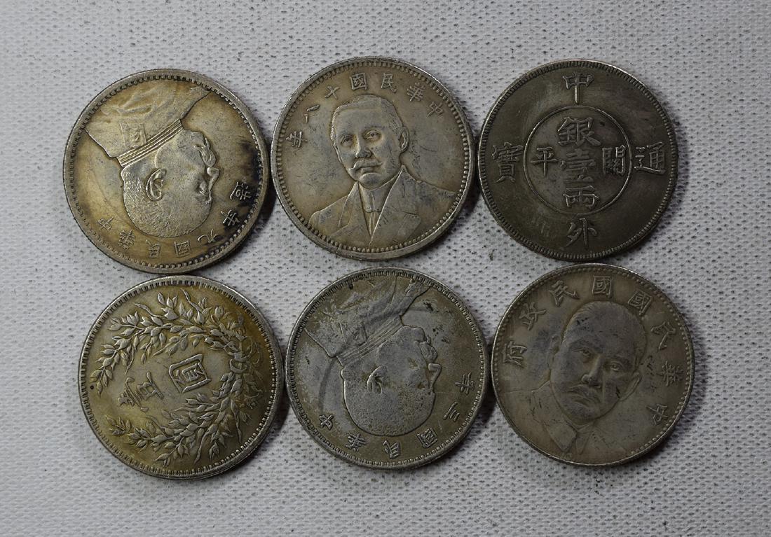 SIX CHINESE DOLLAR COINS: SIX CHINESE DOLLAR COINS. Each weight around 26.5 gram. Domestic shipping $5 and oversea $10. Combined shipping available. We accept pre-sale offer, phone bidding and post sale offer. For buyers from 
