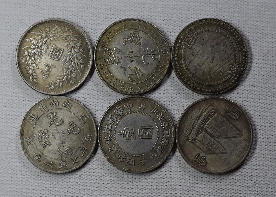 SIX CHINESE DOLLAR COINS: SIX CHINESE DOLLAR COINS. Each weight around 26.5 gram. Domestic shipping $5 and oversea $10. Combined shipping available. We accept pre-sale offer, phone bidding and post sale offer. For buyers from 