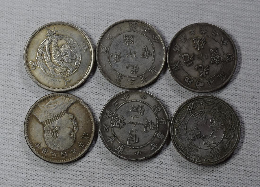 SIX CHINESE DOLLAR COINS: SIX CHINESE DOLLAR COINS. Each weight around 26.5 gram. Domestic shipping $5 and oversea $10. Combined shipping available. We accept pre-sale offer, phone bidding and post sale offer. For buyers from 