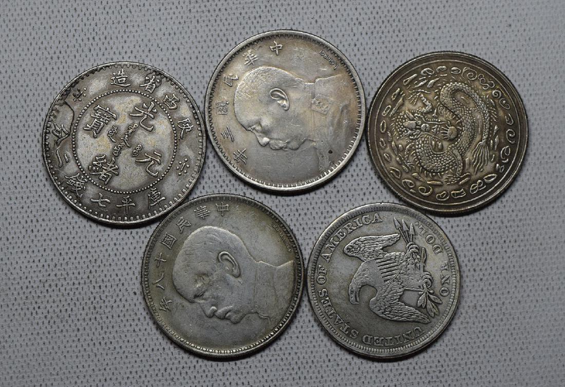 FIVE CHINESE DOLLAR COINS (1 of 3)
