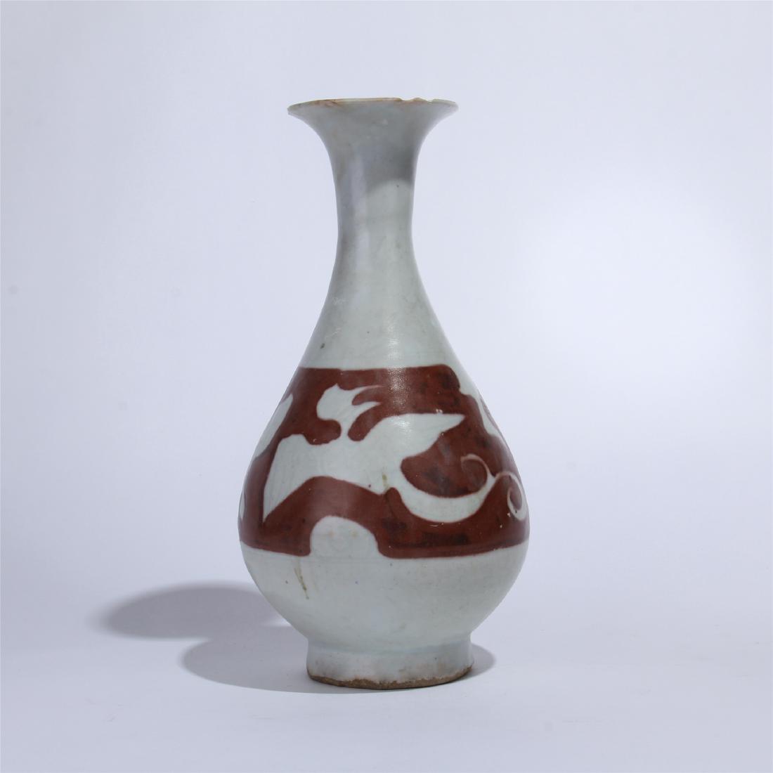 CHINESE PORCELAIN WHITE GLAZE RED PAINTED YUHUCHUN VASE: CHINESE PORCELAIN WHITE GLAZE RED PAINTED YUHUCHUN VASE. H. 25 cm. W. 13 cm. Domestic shipping $30 and oversea $100. Combined shipping available. We accept pre-sale offer, phone bidding and post sale 