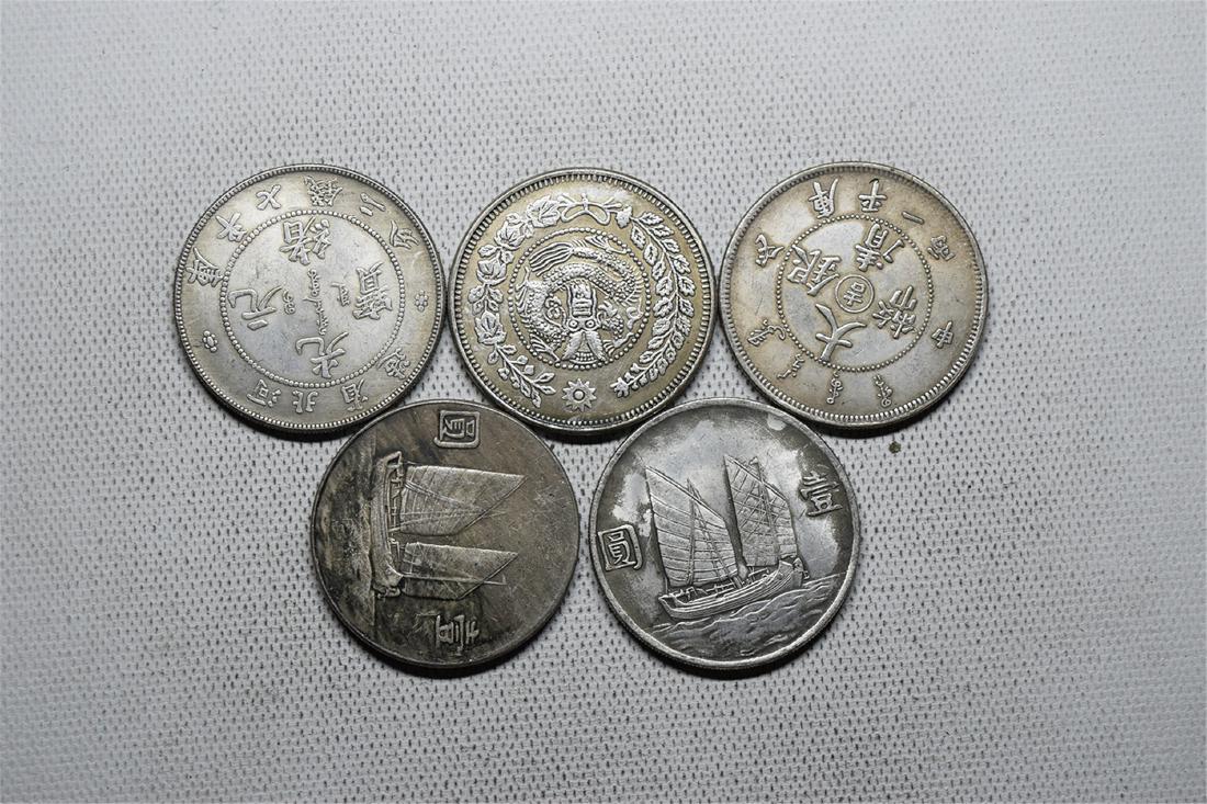 FIVE CHINESE DOLLAR COINS (1 of 3)
