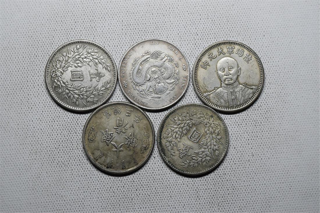 FIVE CHINESE DOLLAR COINS (1 of 3)