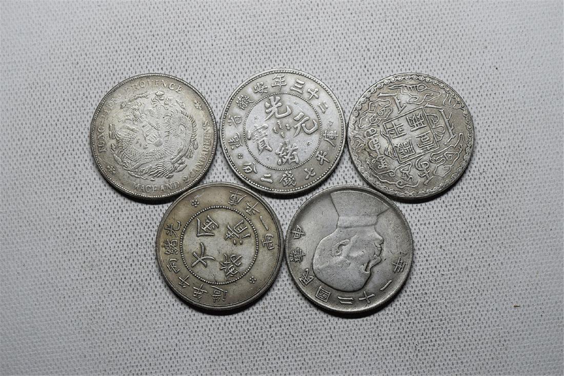 FIVE CHINESE DOLLAR COINS (1 of 3)