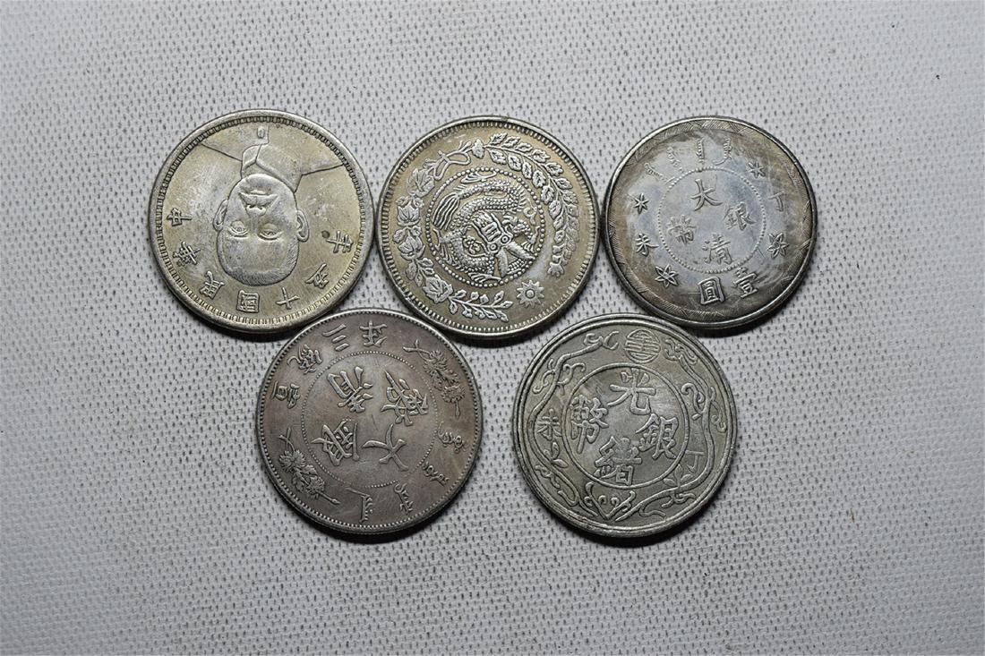 FIVE CHINESE DOLLAR COINS (1 of 3)
