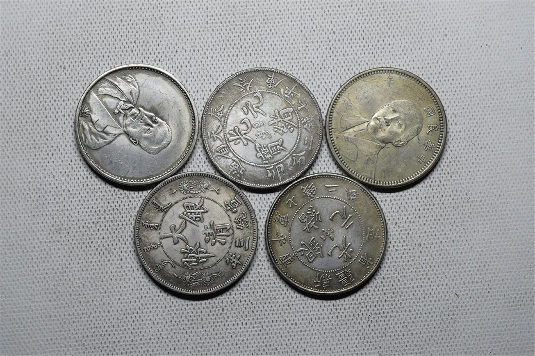 FIVE CHINESE DOLLAR COINS (1 of 3)