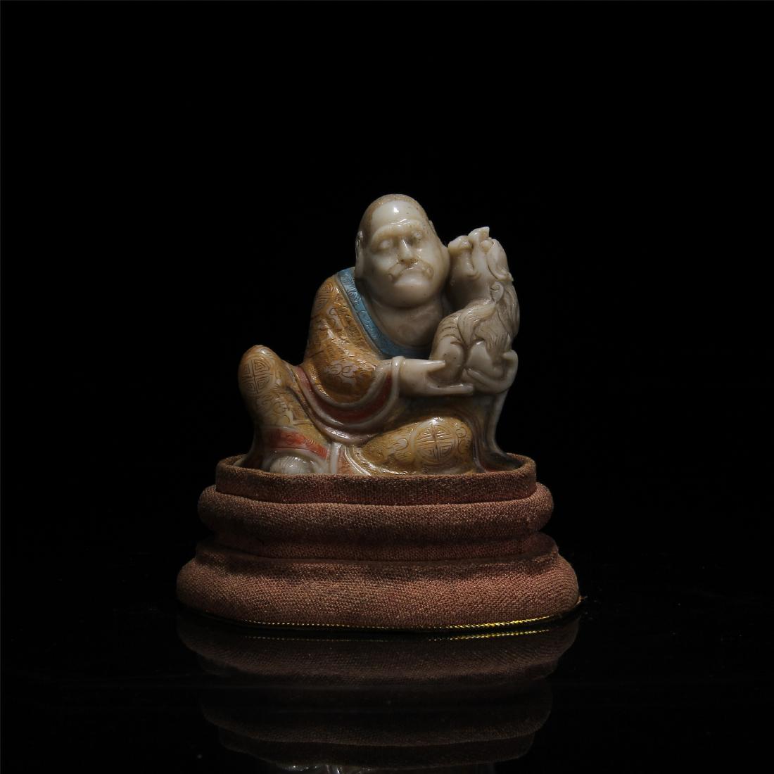 CHINESE SOAPSTONE LOHAN WITH TIGER: CHINESE SOAPSTONE LOHAN WITH TIGER. H.9 cm. W.8 cm. Domestic shipping $20 and oversea $60. Combined shipping available. Pick-up available in our NJ warehouse. We accept pre-sale offer, phone bidding a
