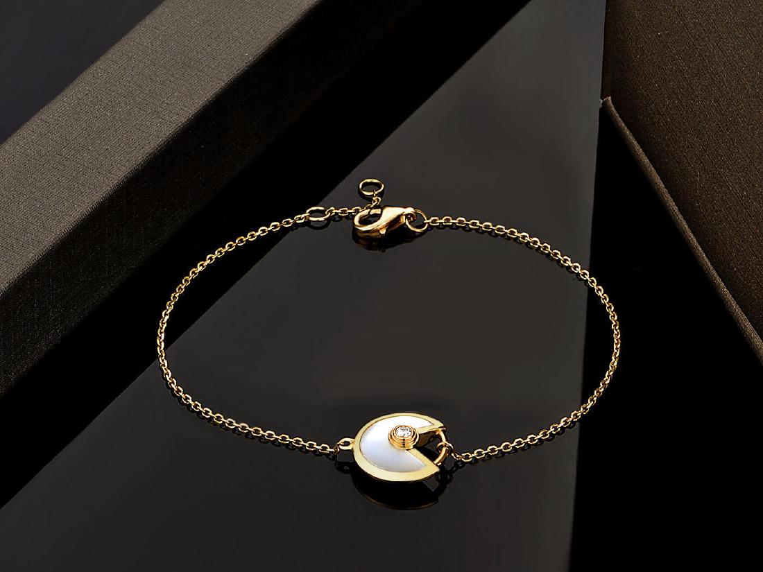CARTIER AMULETTE 18K GOLD DIAMOND AND MOTHER OF PEARL (1 of 3)