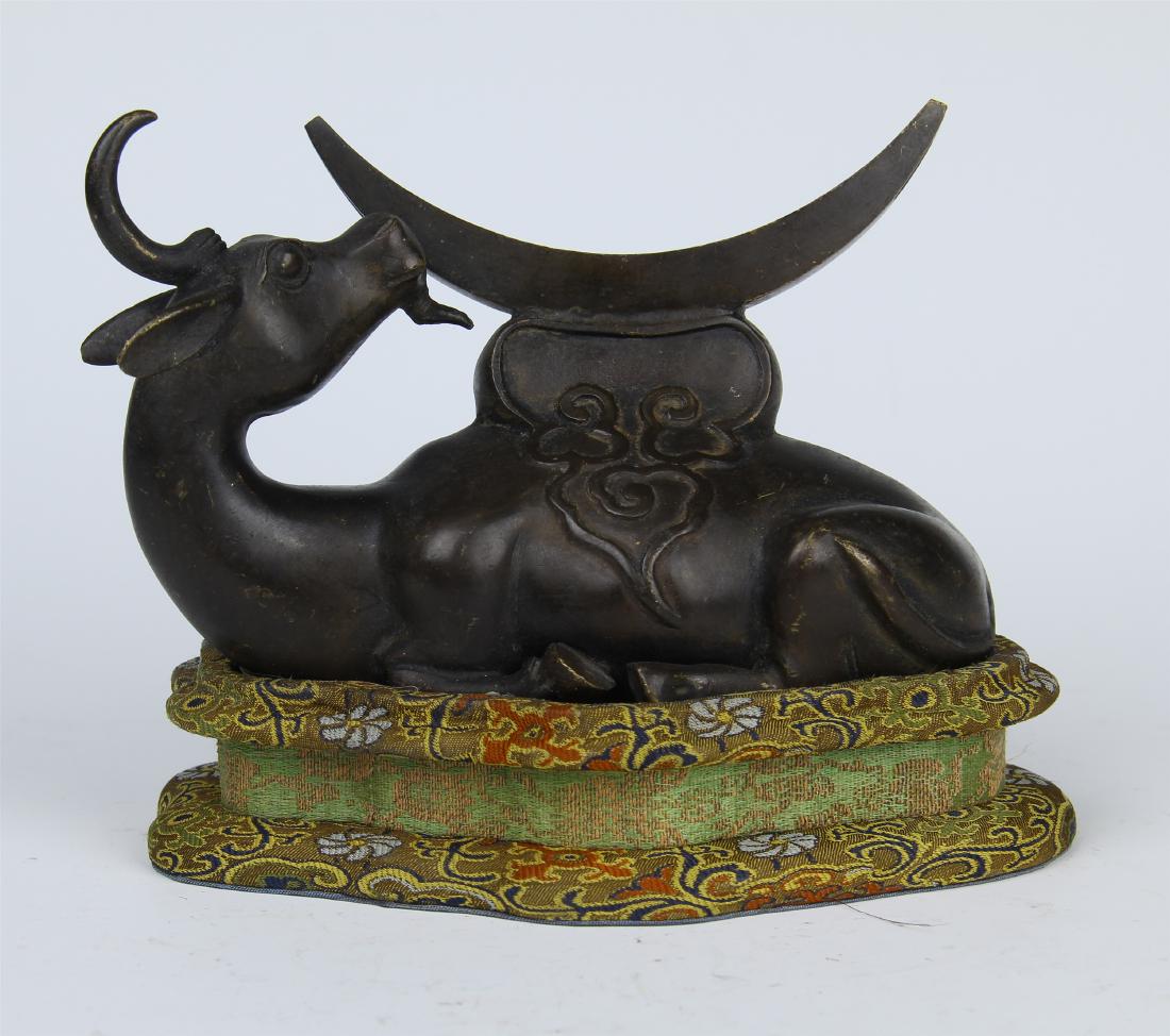 CHINESE BRONZE COUCHING RAM MIRROR HOLDER: CHINESE BRONZE COUCHING RAM MIRROR HOLDER. H. 13.5 cm. L. 16.5 cm. W. 8 cm. Weight 1073 gram. Domestic shipping $30 and oversea $100. Combined shipping available. Pick-up available in our NJ warehouse