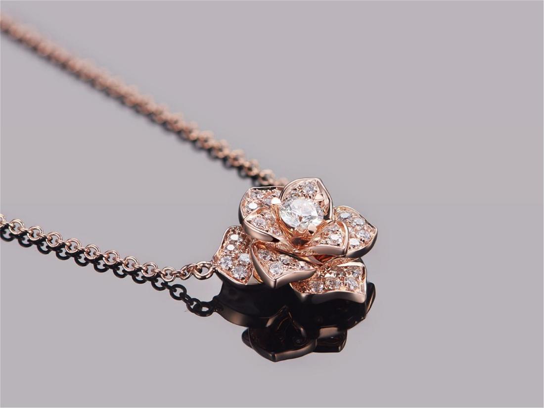 PIAGET 18K ROSE GOLD DIAMOND NECKLACE: PIAGET 18K ROSE GOLD DIAMOND NECKLACE. Weight 4.96 gram. Diamond 0.13 ct/1p and 0.22 ct/37p. Free Shippin. We accept pre-sale offer, phone bidding and post sale offer to save 5% Internet bidding fee. 
