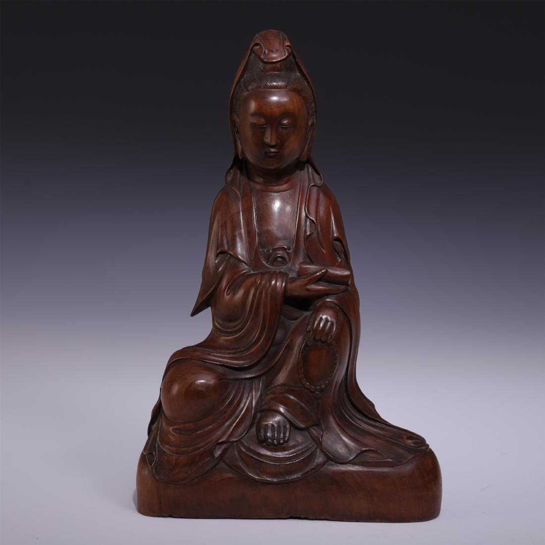 CHINESE ROSEWOOD SEATED GUANYIN: CHINESE ROSEWOOD SEATED GUANYIN. H. 24 cm. L. 14.8 cm. W. 8.5 cm. Weight 480 gram. Domestic shipping $30 and oversea $100. Combined shipping available. Pick-up available in our NJ warehouse. We accept