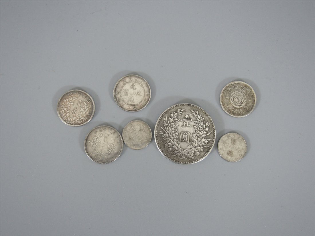SEVEN CHINESE SILVER COINS (1 of 4)