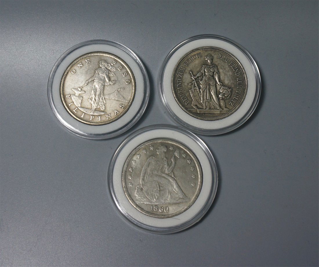 THREE CHINESE SILVER COINS (1 of 2)