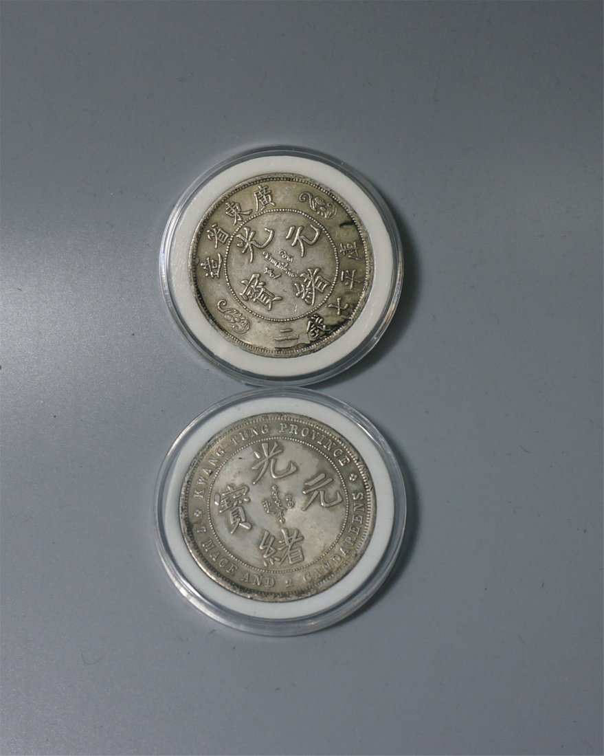 TWO CHINESE SILVER COINS (1 of 2)