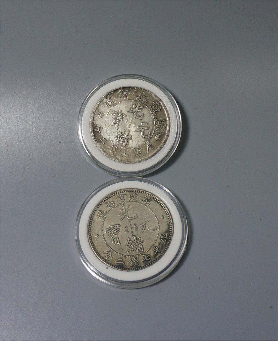 TWO CHINESE SILVER COINS (1 of 2)