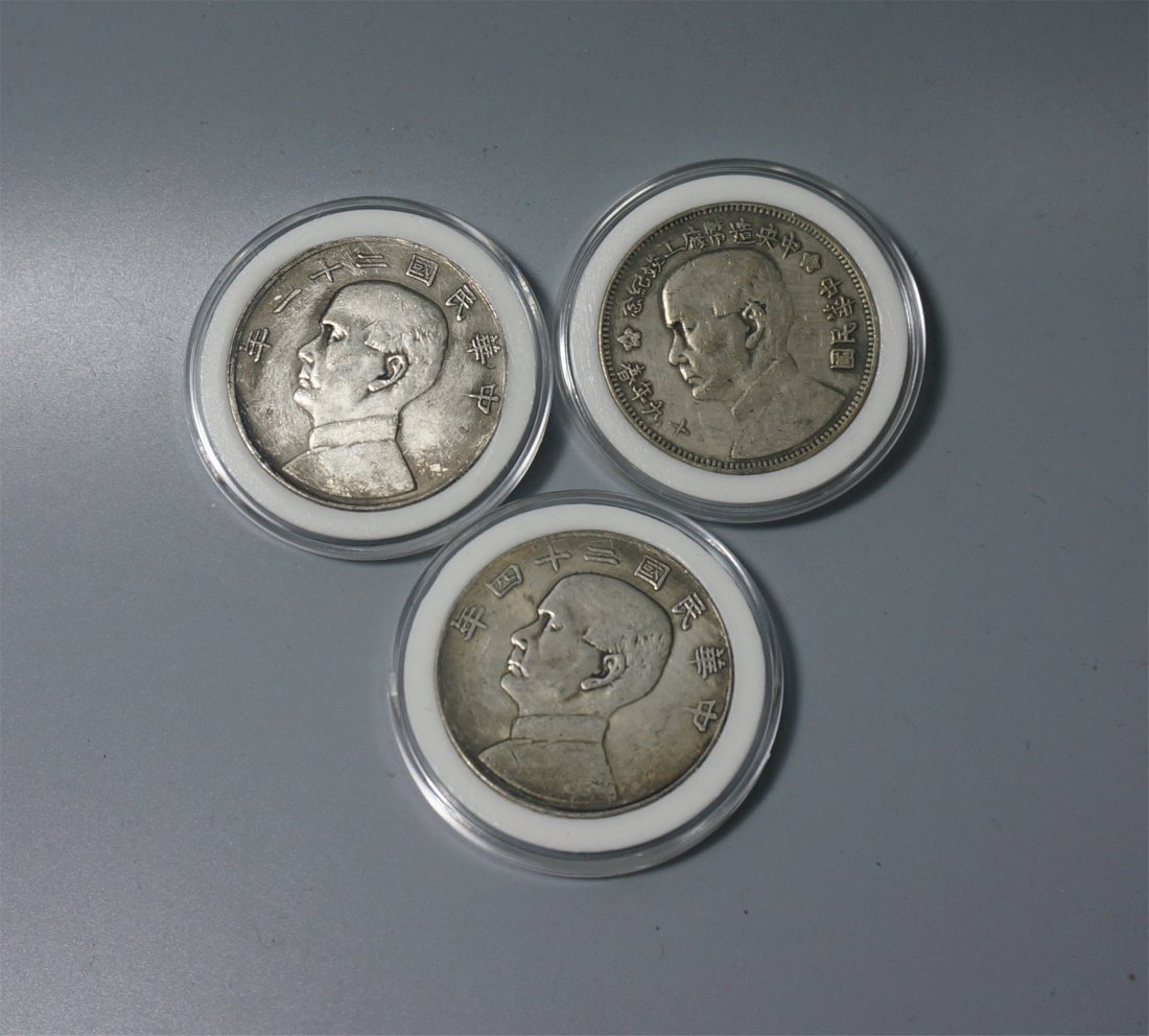THREE CHINESE SILVER COINS (1 of 2)