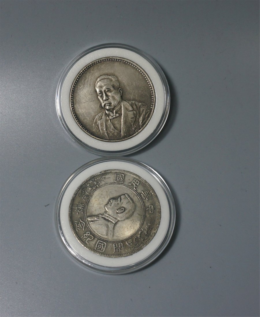TWO CHINESE SILVER COINS (1 of 2)