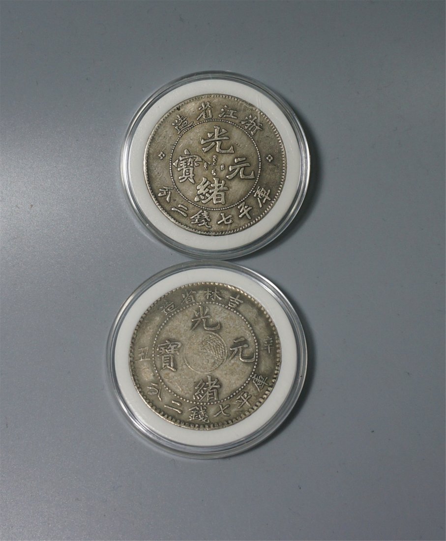 TWO CHINESE SILVER COINS (1 of 2)