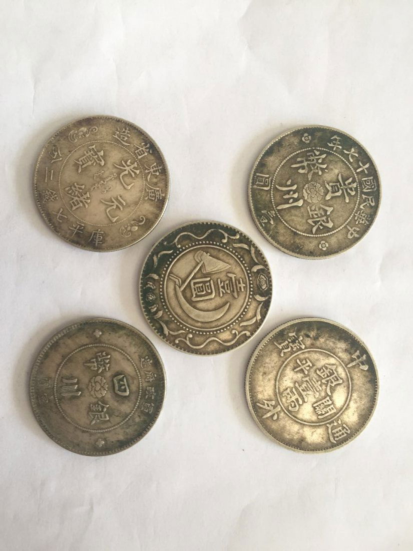 FIVE CHINESE SILVER DOLLAR COINS (1 of 5)