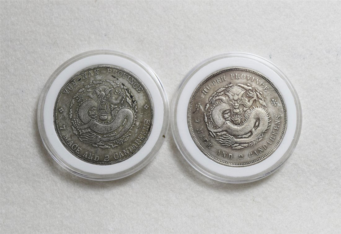 TWO CHINESE DOLLAR SILVER COINS (1 of 2)