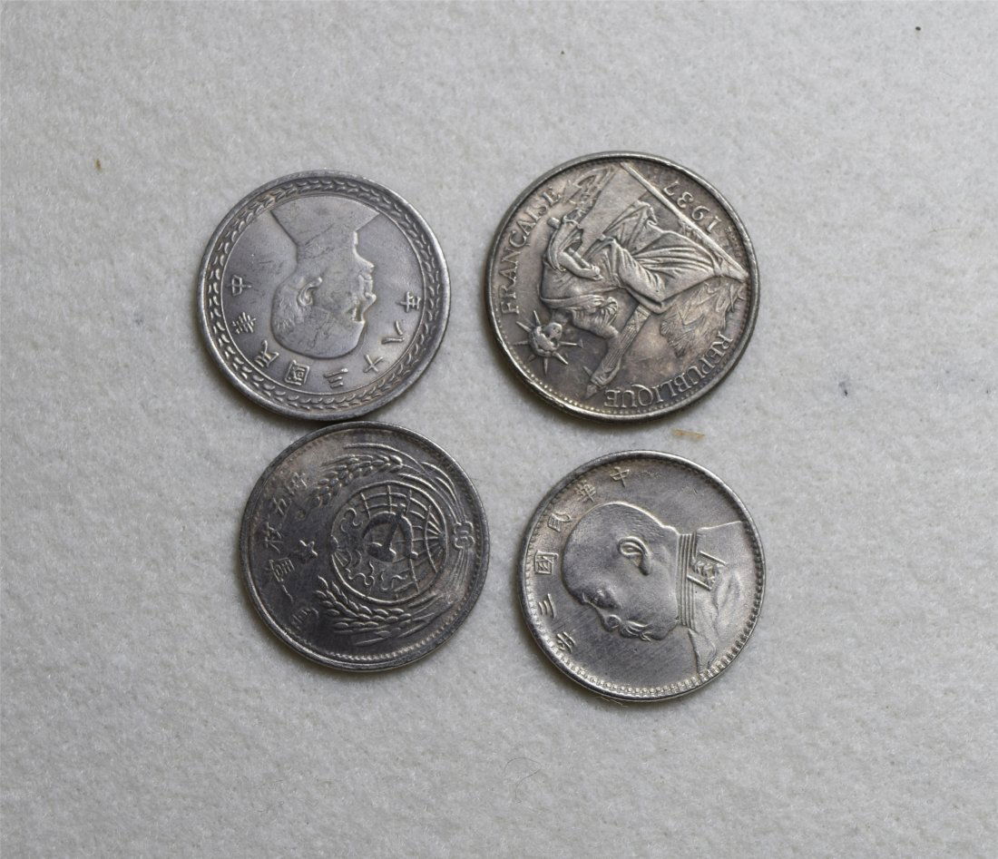 FOUR CHINESE SILVER COINS (1 of 2)
