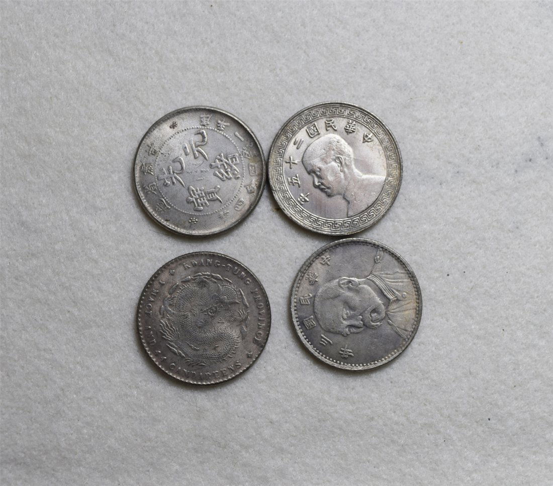 FOUR CHINESE SILVER COINS (1 of 2)