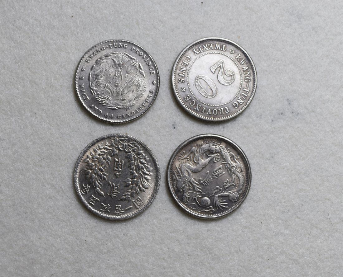 FOUR CHINESE SILVER COINS (1 of 2)