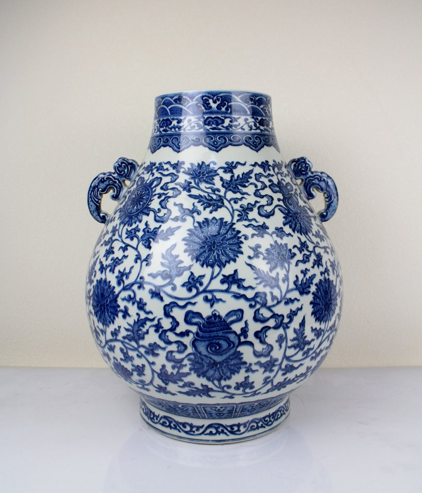 CHINESE PORCELAIN BLUE AND WHITE FLOWER ZUN VASE (1 of 4)