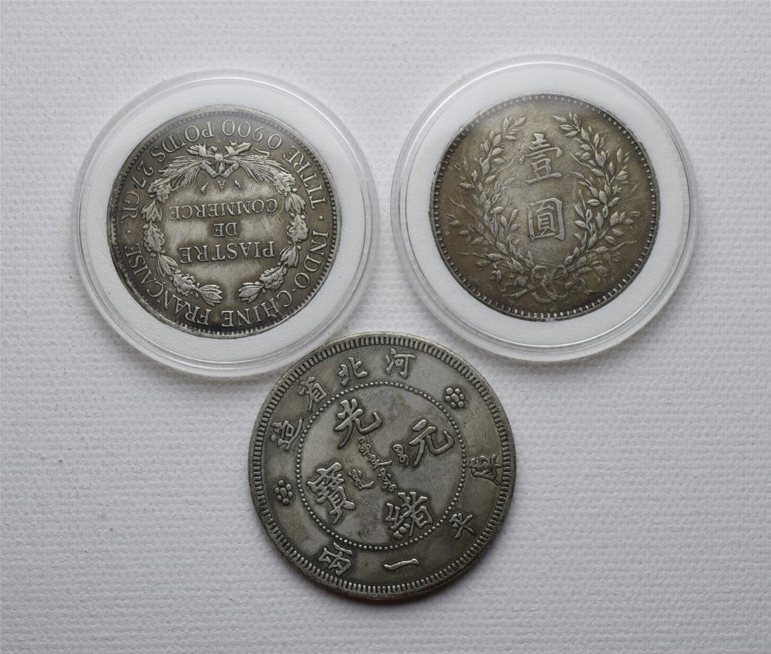 THREE CHINESE DOLLAR SILVER COINS (1 of 2)