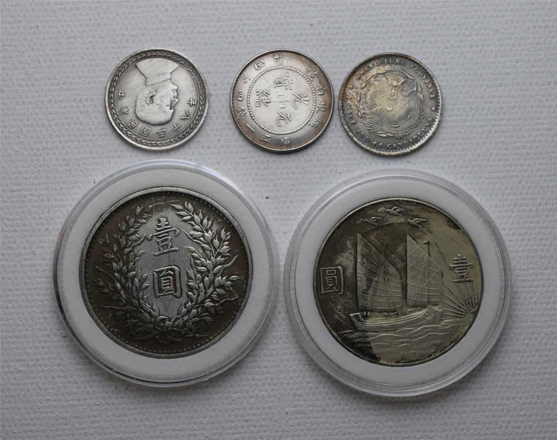FIVE CHINESE SILVER COINS (1 of 2)