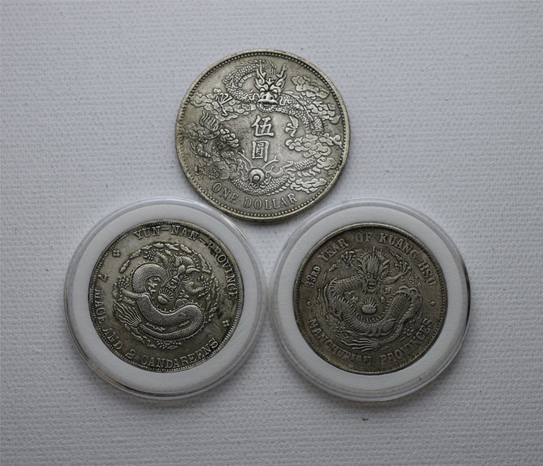 THREE CHINESE SILVER DOLLAR COINS (1 of 2)
