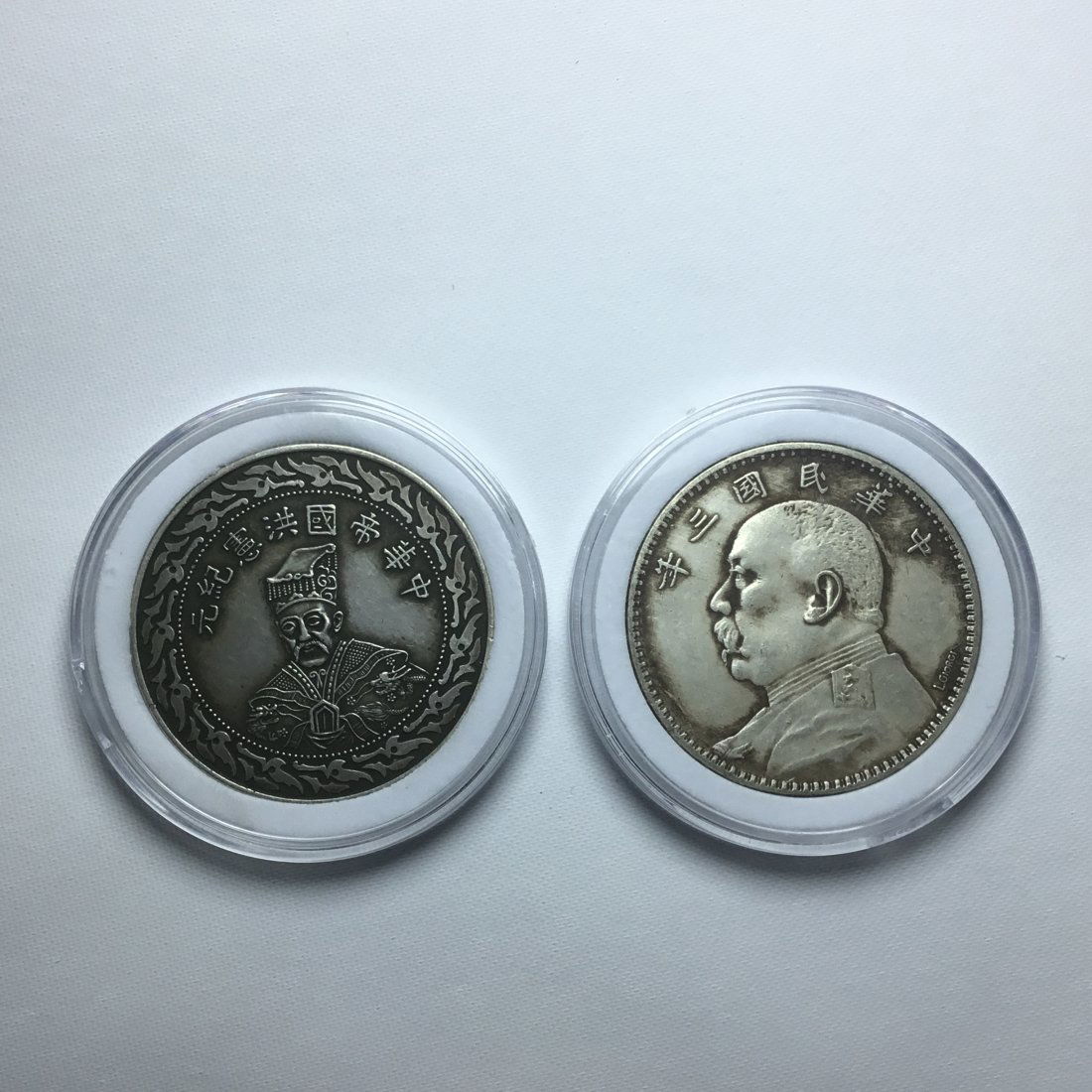 TWO CHINESE SILVER DOLLAR COINS (1 of 3)