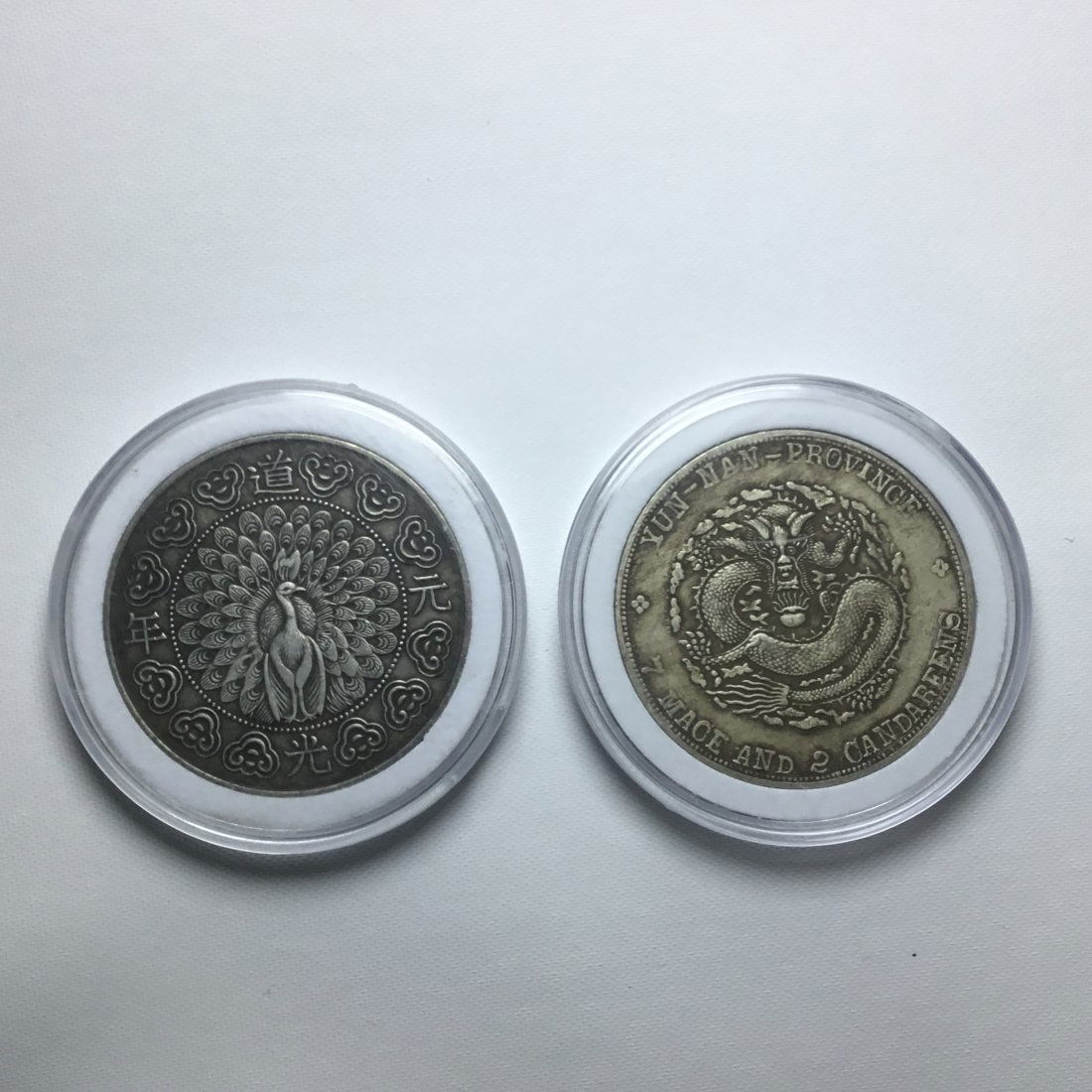 TWO CHINESE SILVER DOLLAR COINS (1 of 3)