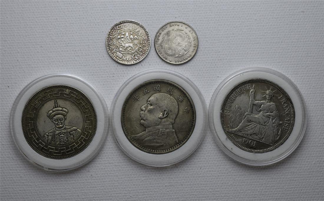FIVE CHINESE SILVER COINS (1 of 2)