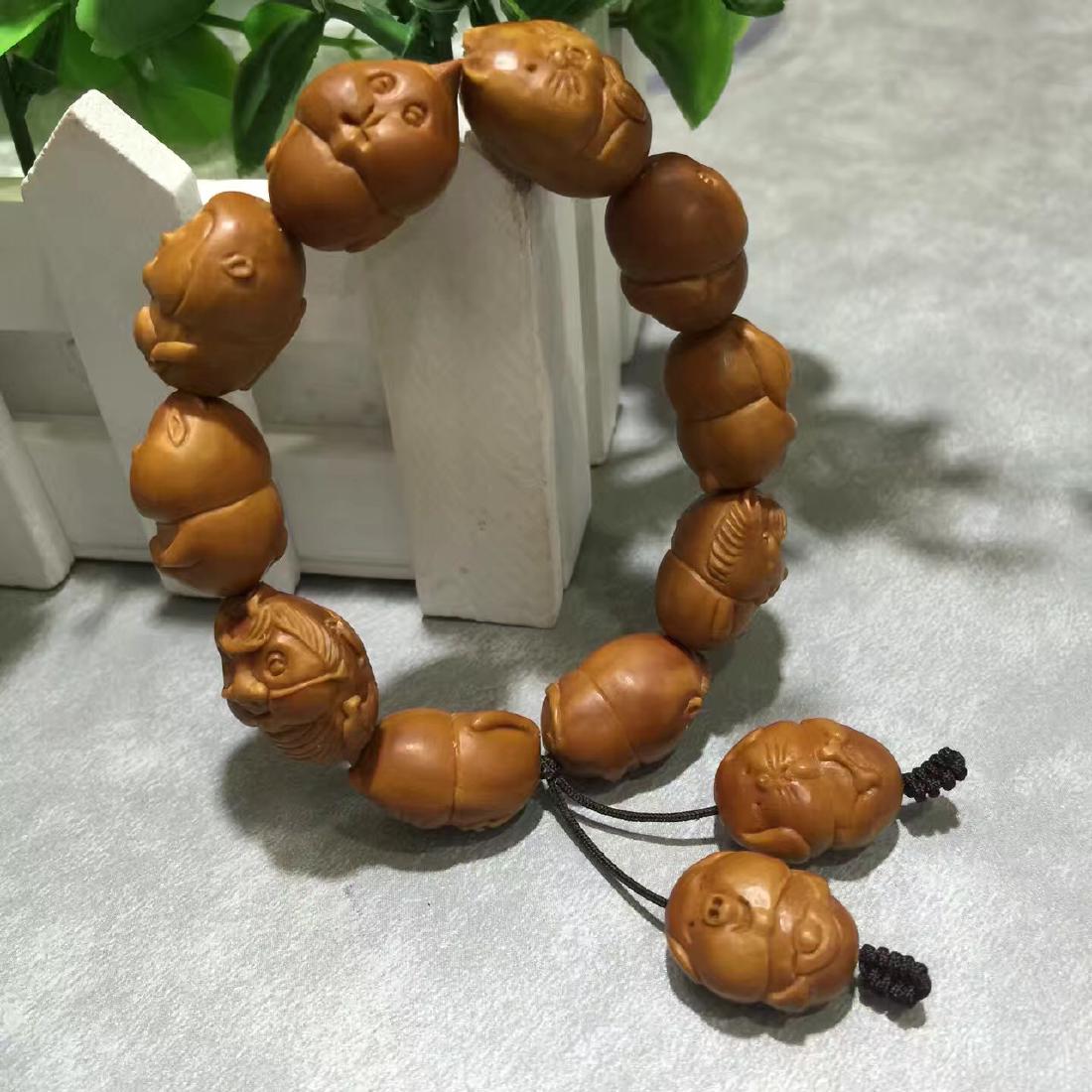OLIVE NUT CARVED TWEELVE ZODIAC BEADS WAIST LACE: OLIVE NUT CARVED TWEELVE ZODIAC BEADS WAIST LACE. Domestic shipping $10 and oversea $20. Combined shipping available.