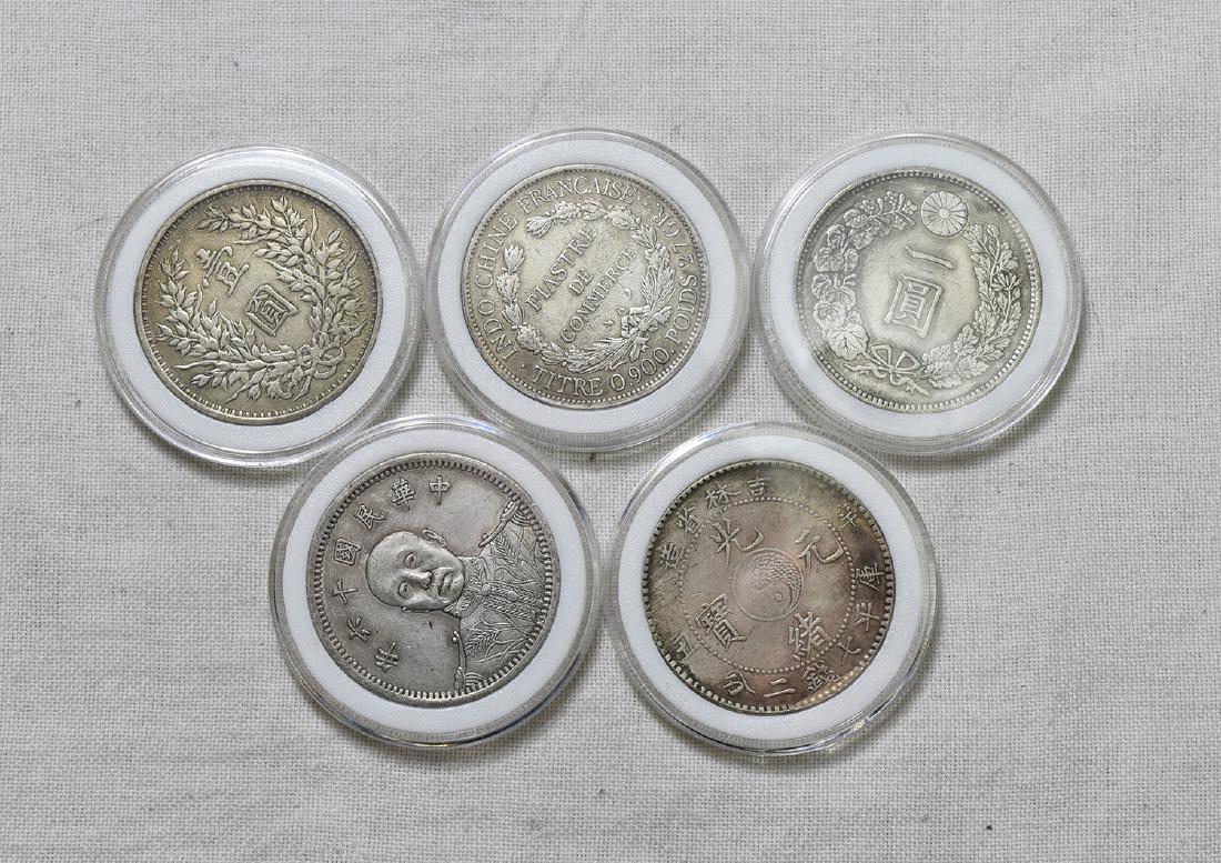 FIVE CHINESE SILVER COINS (1 of 2)