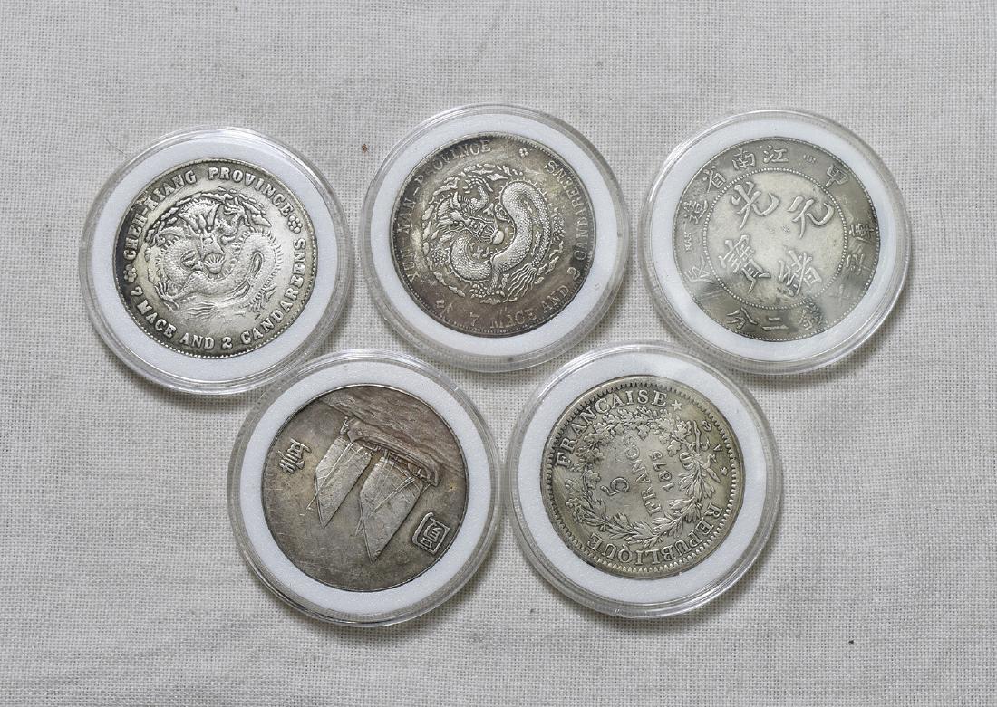 FIVE CHINESE SILVER COINS (1 of 2)