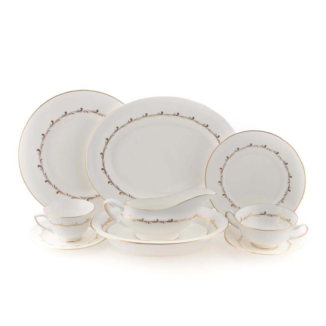 Royal Doulton bone china "Rondo" service: Pattern H4935, comprising 88 pieces, including: 12 dinner plates, 12 salad plates, 12 bread and butter plates, 12 bouillon with saucers, 12 cups with 11 saucers, two oval serving platters, two side di