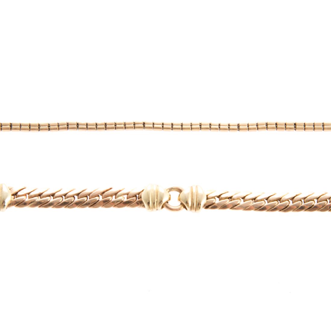 Pair of Lady's 14K Link Bracelets: 1) 14K yellow gold station curb link bracelet by Unoaerre with heavy lobster clasp, 7.75 in. L. and 2) 14K yellow gold box link bracelet with box clasp and figure 8 safety, 7.5 in. L., 22 grams